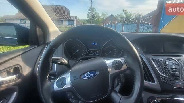 Синій Форд Фокус, об'ємом двигуна 2 л та пробігом 212 тис. км за 7500 $, фото 9 на Automoto.ua