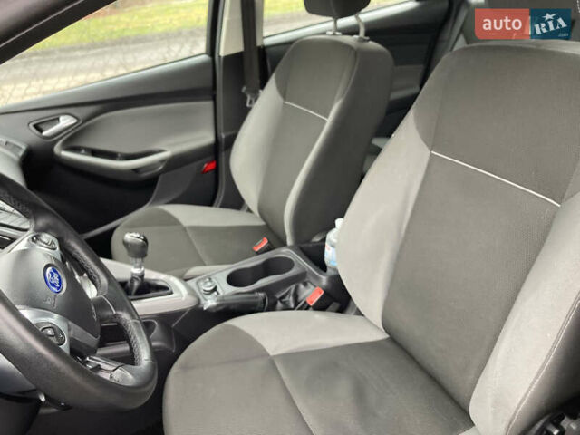 Синій Форд Фокус, об'ємом двигуна 1.6 л та пробігом 237 тис. км за 6950 $, фото 13 на Automoto.ua