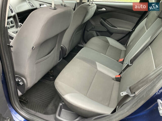 Синій Форд Фокус, об'ємом двигуна 1.6 л та пробігом 237 тис. км за 6950 $, фото 14 на Automoto.ua