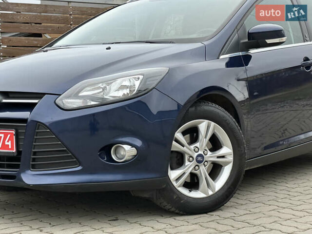 Синій Форд Фокус, об'ємом двигуна 1.6 л та пробігом 235 тис. км за 7699 $, фото 4 на Automoto.ua