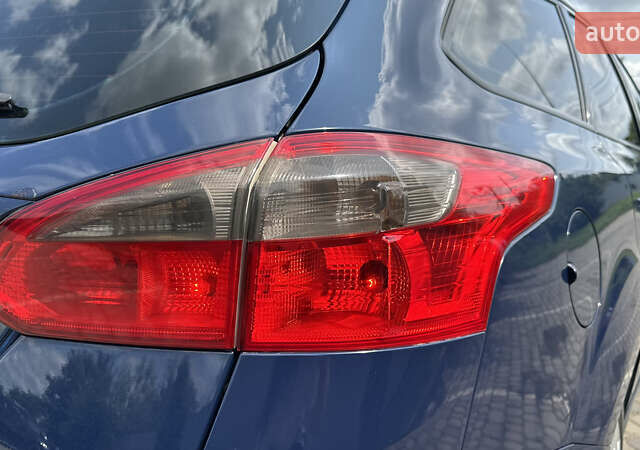 Синій Форд Фокус, об'ємом двигуна 1.6 л та пробігом 236 тис. км за 6450 $, фото 19 на Automoto.ua