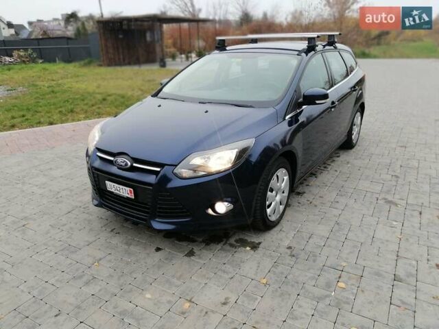 Синій Форд Фокус, об'ємом двигуна 1.6 л та пробігом 215 тис. км за 7599 $, фото 21 на Automoto.ua