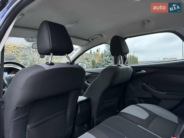 Синій Форд Фокус, об'ємом двигуна 1.6 л та пробігом 235 тис. км за 7699 $, фото 41 на Automoto.ua