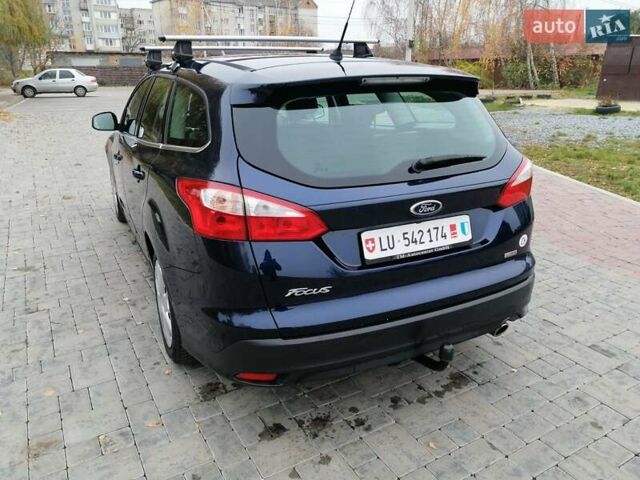 Синій Форд Фокус, об'ємом двигуна 1.6 л та пробігом 215 тис. км за 7599 $, фото 60 на Automoto.ua
