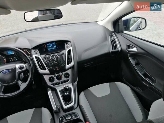 Синій Форд Фокус, об'ємом двигуна 1.6 л та пробігом 215 тис. км за 7599 $, фото 44 на Automoto.ua