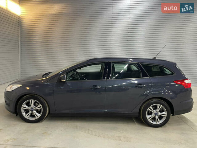 Синій Форд Фокус, об'ємом двигуна 1.6 л та пробігом 217 тис. км за 8350 $, фото 4 на Automoto.ua