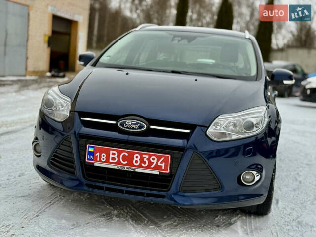 Синій Форд Фокус, об'ємом двигуна 1 л та пробігом 106 тис. км за 5499 $, фото 1 на Automoto.ua