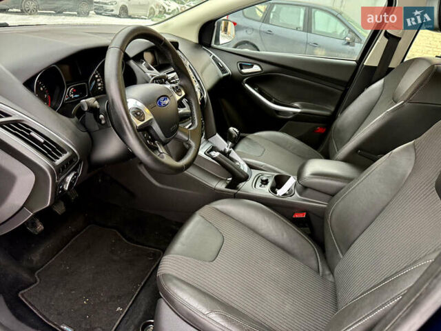 Синій Форд Фокус, об'ємом двигуна 1 л та пробігом 106 тис. км за 5499 $, фото 11 на Automoto.ua
