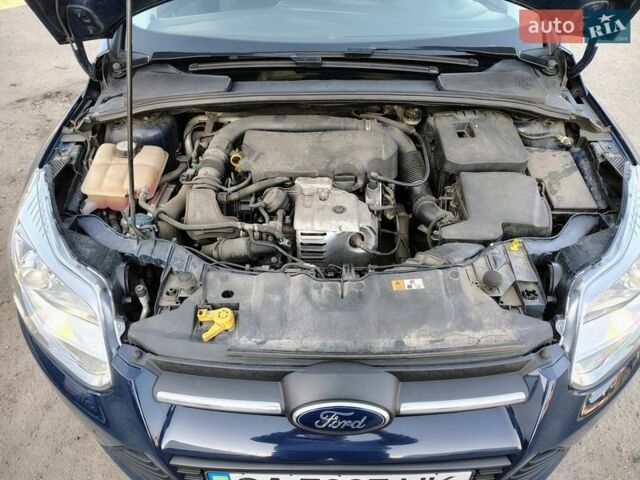 Синій Форд Фокус, об'ємом двигуна 1 л та пробігом 184 тис. км за 7500 $, фото 10 на Automoto.ua