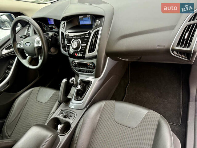 Синій Форд Фокус, об'ємом двигуна 1 л та пробігом 106 тис. км за 5499 $, фото 26 на Automoto.ua