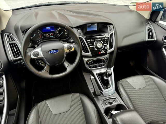 Синій Форд Фокус, об'ємом двигуна 1 л та пробігом 106 тис. км за 5499 $, фото 20 на Automoto.ua