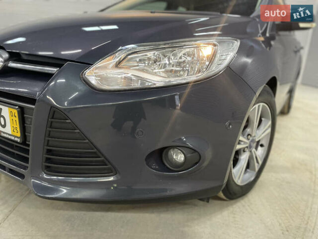 Синій Форд Фокус, об'ємом двигуна 1.6 л та пробігом 217 тис. км за 8350 $, фото 21 на Automoto.ua