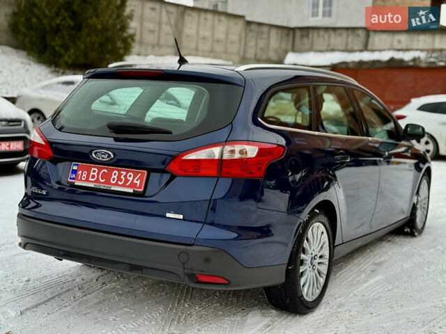 Синій Форд Фокус, об'ємом двигуна 1 л та пробігом 106 тис. км за 5499 $, фото 6 на Automoto.ua