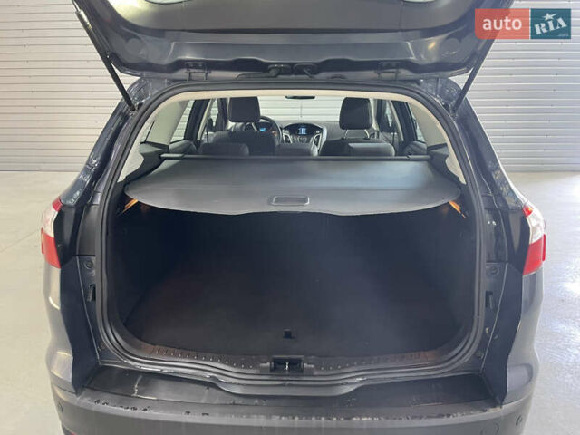 Синий Форд Фокус, объемом двигателя 1.6 л и пробегом 217 тыс. км за 7750 $, фото 11 на Automoto.ua