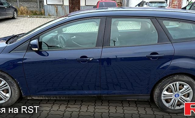 Синій Форд Фокус, об'ємом двигуна 1.6 л та пробігом 208 тис. км за 8350 $, фото 12 на Automoto.ua