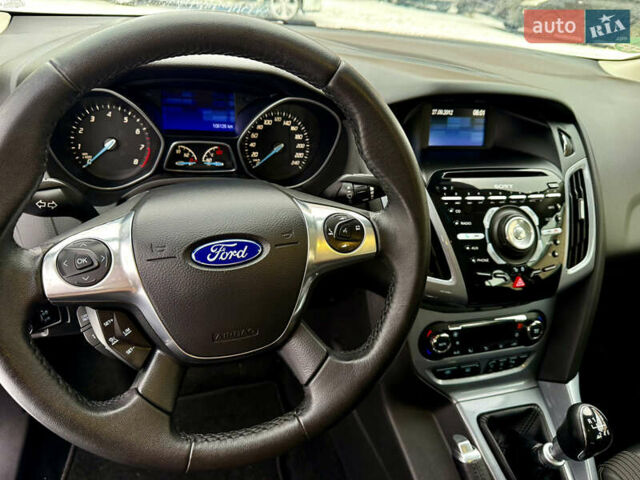 Синій Форд Фокус, об'ємом двигуна 1 л та пробігом 106 тис. км за 5499 $, фото 15 на Automoto.ua
