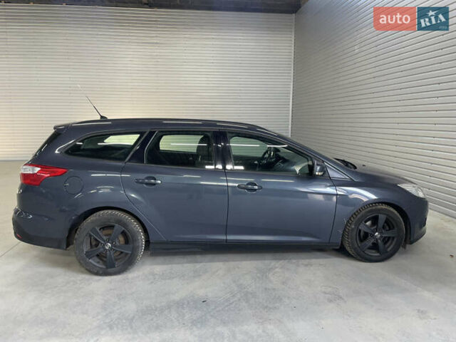 Синий Форд Фокус, объемом двигателя 1.6 л и пробегом 217 тыс. км за 7750 $, фото 4 на Automoto.ua