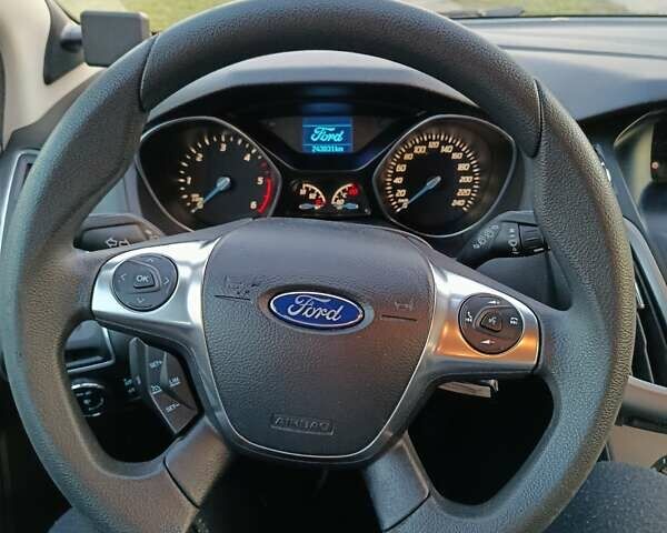 Синій Форд Фокус, об'ємом двигуна 1.6 л та пробігом 243 тис. км за 7300 $, фото 17 на Automoto.ua