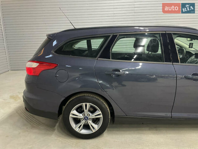 Синій Форд Фокус, об'ємом двигуна 1.6 л та пробігом 217 тис. км за 8350 $, фото 15 на Automoto.ua