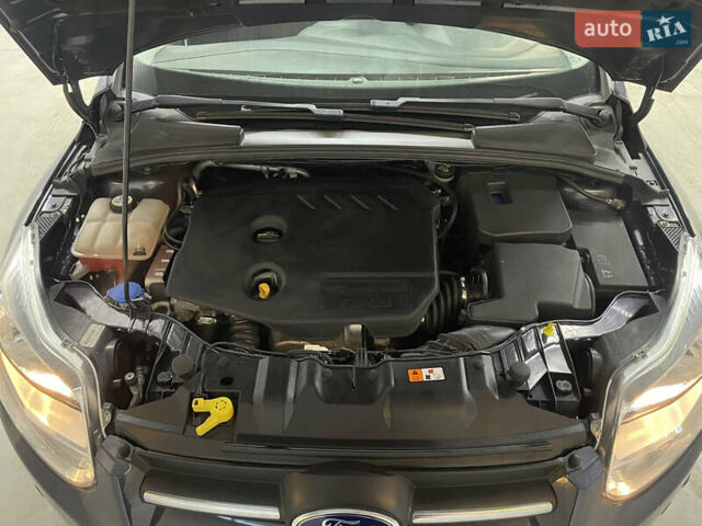 Синій Форд Фокус, об'ємом двигуна 1.6 л та пробігом 217 тис. км за 8350 $, фото 25 на Automoto.ua