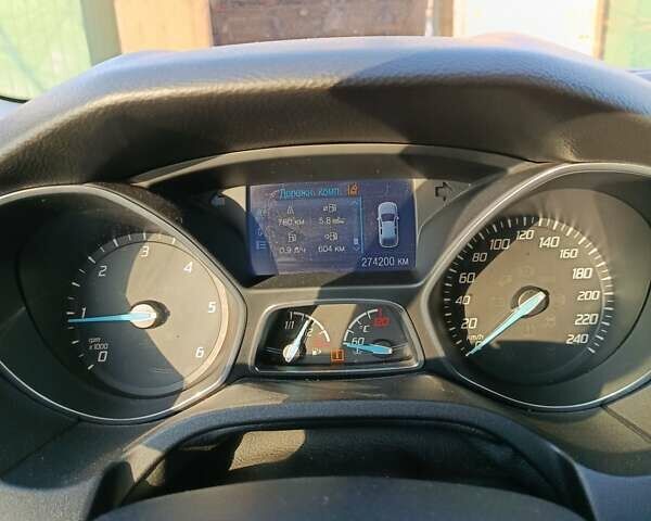 Синий Форд Фокус, объемом двигателя 1.6 л и пробегом 274 тыс. км за 8499 $, фото 6 на Automoto.ua