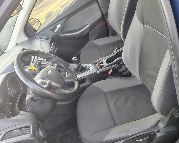 Синій Форд Фокус, об'ємом двигуна 1 л та пробігом 184 тис. км за 7500 $, фото 8 на Automoto.ua