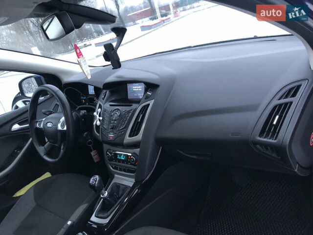 Синий Форд Фокус, объемом двигателя 1.6 л и пробегом 297 тыс. км за 8600 $, фото 14 на Automoto.ua