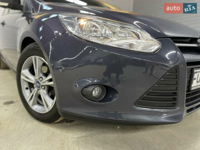 Синій Форд Фокус, об'ємом двигуна 1.6 л та пробігом 217 тис. км за 8350 $, фото 6 на Automoto.ua