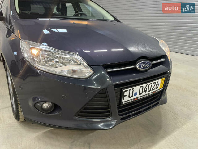 Синій Форд Фокус, об'ємом двигуна 1.6 л та пробігом 217 тис. км за 8350 $, фото 19 на Automoto.ua