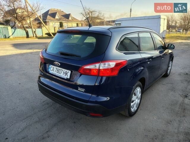 Синій Форд Фокус, об'ємом двигуна 1 л та пробігом 184 тис. км за 7500 $, фото 7 на Automoto.ua