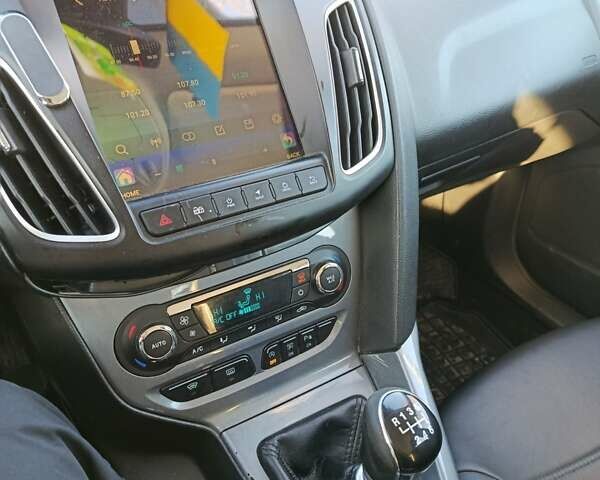 Синий Форд Фокус, объемом двигателя 1.6 л и пробегом 274 тыс. км за 8499 $, фото 7 на Automoto.ua