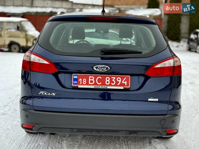 Синій Форд Фокус, об'ємом двигуна 1 л та пробігом 106 тис. км за 5499 $, фото 7 на Automoto.ua