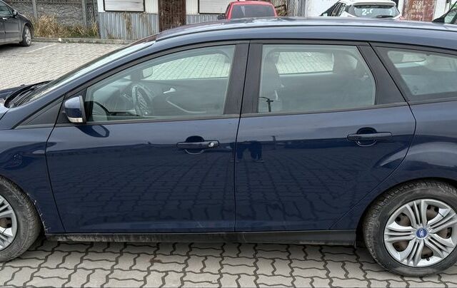 Синій Форд Фокус, об'ємом двигуна 1.6 л та пробігом 208 тис. км за 8350 $, фото 2 на Automoto.ua