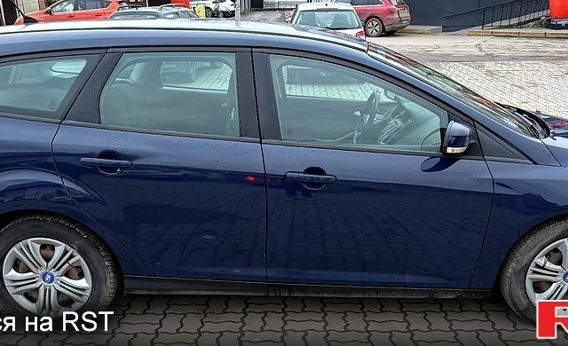Синій Форд Фокус, об'ємом двигуна 1.6 л та пробігом 208 тис. км за 8350 $, фото 8 на Automoto.ua