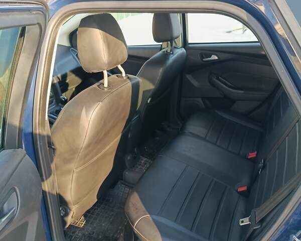 Синий Форд Фокус, объемом двигателя 1.6 л и пробегом 274 тыс. км за 8499 $, фото 4 на Automoto.ua