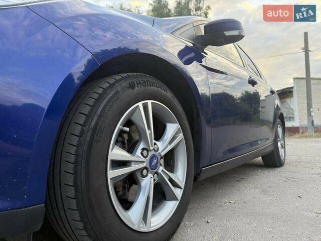 Синій Форд Фокус, об'ємом двигуна 1 л та пробігом 175 тис. км за 5750 $, фото 13 на Automoto.ua