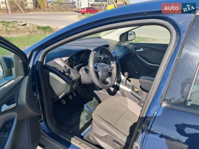 Синий Форд Фокус, объемом двигателя 1.56 л и пробегом 253 тыс. км за 6799 $, фото 8 на Automoto.ua