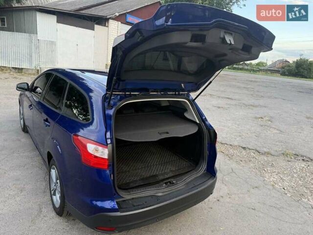 Синій Форд Фокус, об'ємом двигуна 1 л та пробігом 175 тис. км за 5750 $, фото 14 на Automoto.ua