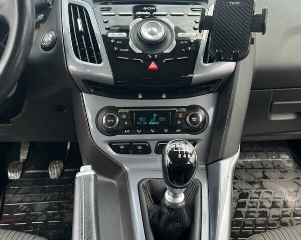 Синій Форд Фокус, об'ємом двигуна 1.6 л та пробігом 166 тис. км за 9199 $, фото 19 на Automoto.ua