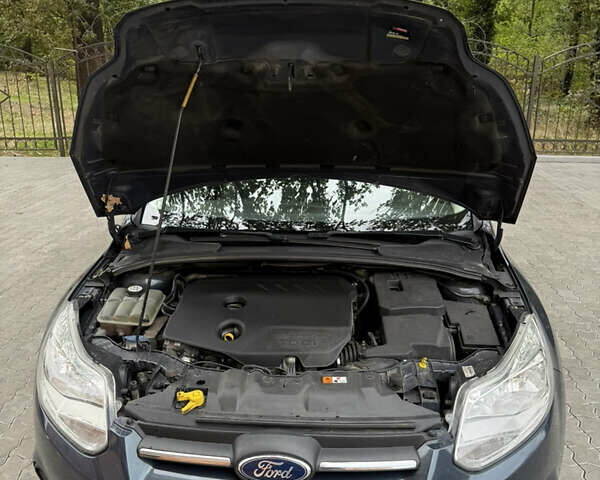 Синій Форд Фокус, об'ємом двигуна 1.6 л та пробігом 285 тис. км за 7250 $, фото 13 на Automoto.ua