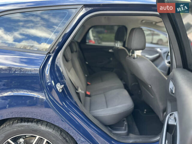 Синій Форд Фокус, об'ємом двигуна 1.6 л та пробігом 146 тис. км за 8830 $, фото 26 на Automoto.ua