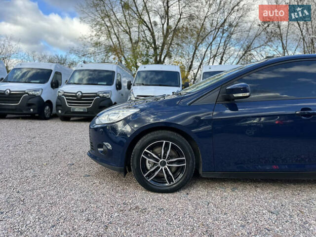 Синий Форд Фокус, объемом двигателя 1.6 л и пробегом 144 тыс. км за 8830 $, фото 5 на Automoto.ua