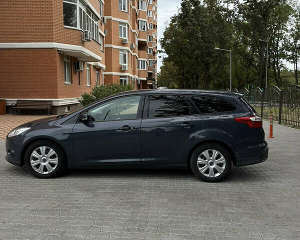 Синій Форд Фокус, об'ємом двигуна 1.6 л та пробігом 285 тис. км за 7250 $, фото 11 на Automoto.ua