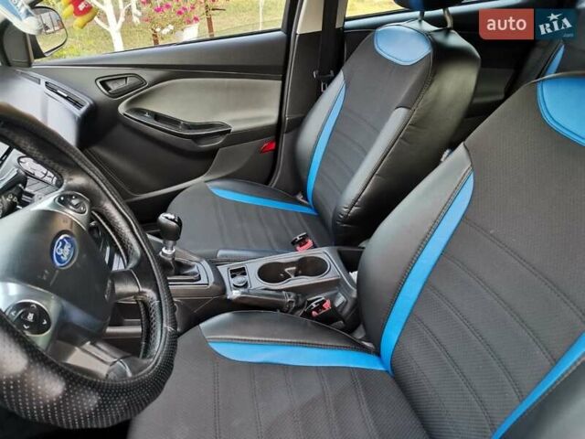 Синий Форд Фокус, объемом двигателя 1.6 л и пробегом 240 тыс. км за 7800 $, фото 10 на Automoto.ua