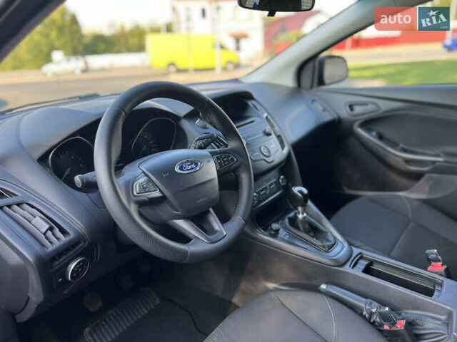 Синий Форд Фокус, объемом двигателя 1.5 л и пробегом 241 тыс. км за 8500 $, фото 9 на Automoto.ua