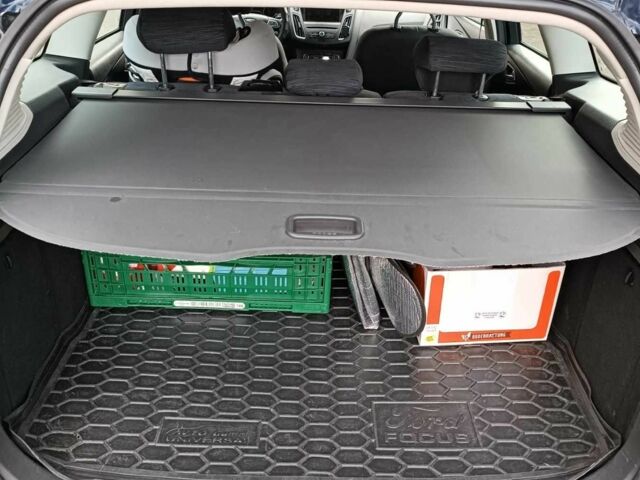 Синій Форд Фокус, об'ємом двигуна 1.5 л та пробігом 245 тис. км за 9900 $, фото 2 на Automoto.ua