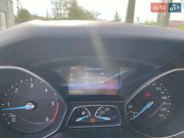 Синий Форд Фокус, объемом двигателя 1.5 л и пробегом 164 тыс. км за 9300 $, фото 5 на Automoto.ua