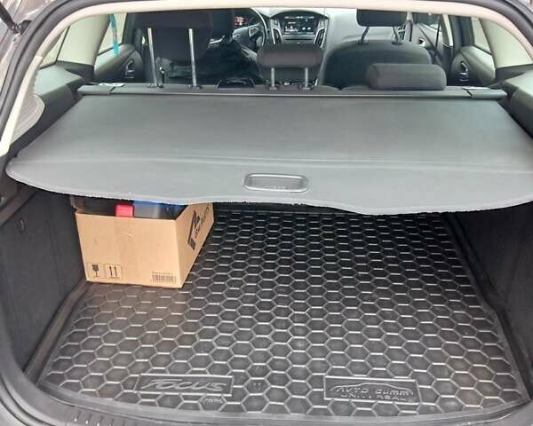 Синій Форд Фокус, об'ємом двигуна 1.5 л та пробігом 189 тис. км за 10200 $, фото 17 на Automoto.ua