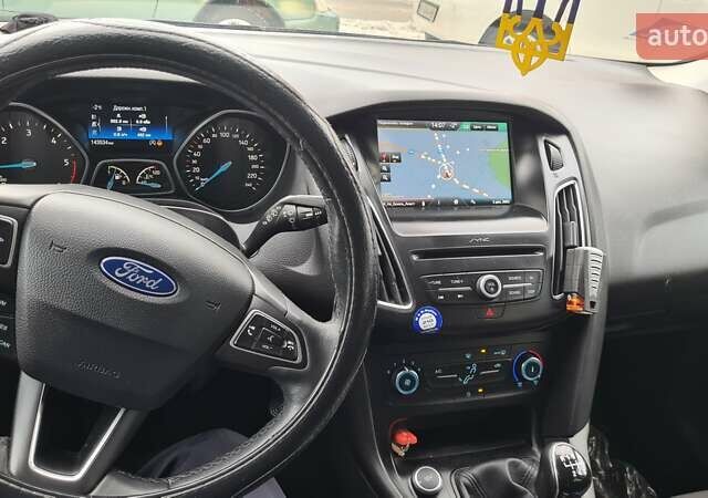 Синій Форд Фокус, об'ємом двигуна 1.5 л та пробігом 160 тис. км за 10137 $, фото 1 на Automoto.ua