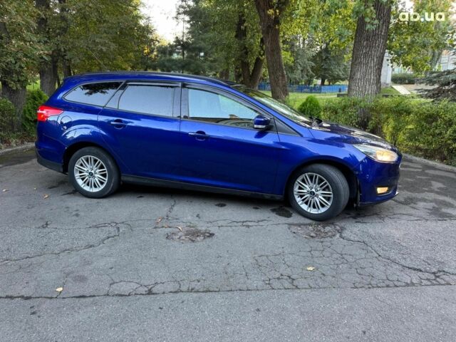 Синій Форд Фокус, об'ємом двигуна 1.5 л та пробігом 190 тис. км за 10940 $, фото 3 на Automoto.ua